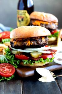 1 (1/4 Lb) Bacon Cheeseburger with 1/4 Lb Meat, Mayonnaise or Salad Dressing and Tomatoes on Bun