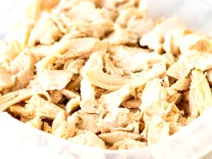 1/2 Breast, Bone Removed Chicken Breast Meat and Skin (Broilers or Fryers, Stewed, Cooked)