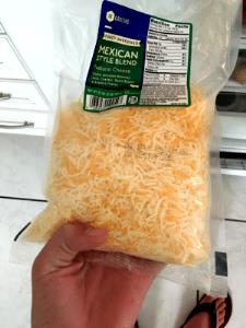 1/4 cup (28 g) Shredded Central American Cheese