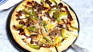 1/8 Pizza Large Philly Cheese Steak Feast: Philly Meat, Mushroom, Green Pepper, Onion, Provolone Cheese, American Cheese Feast Pizza