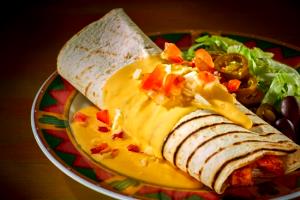 1 burrito (302 g) Santa Fe Burrito - Chicken (Regular)