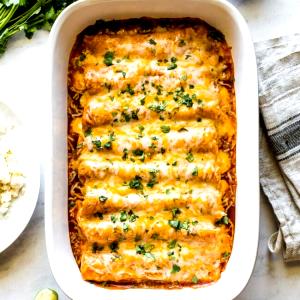 1 enchilada Chicken Enchiladas with Cheese Sauce & Rice