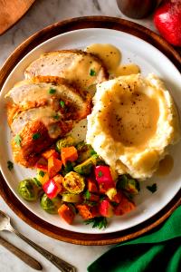 1 meal (241 g) Slow Roasted Turkey Breast with Gravy, Mashed Potatoes and Mixed Vegetables