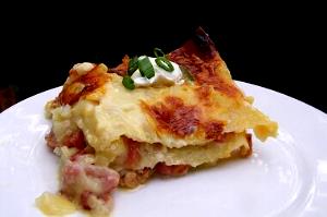 1 Medium (2-1/4" To 3" Dia, Raw) Yields Mashed Potato made with Milk, Fat and Cheese (from Fresh)