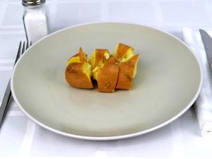 1 Medium (2" Dia, 5" Long, Raw) Sweet Potato (with Salt, Baked In Skin, Cooked)