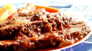 1 Medium Piece With Sauce Swiss Steak