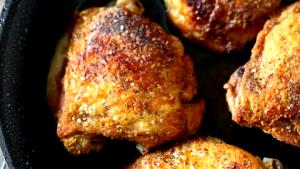 1 Medium (yield After Cooking, Bone Removed) Baked or Fried Coated Chicken Thigh with Skin