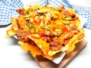 1 nachos (426 g) Chicken Mucho Nachos without Refried Beans