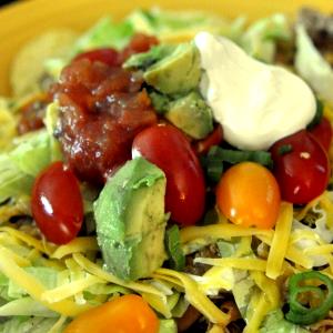 1 Oz Chalupa with Beans, Cheese, Lettuce and Tomato