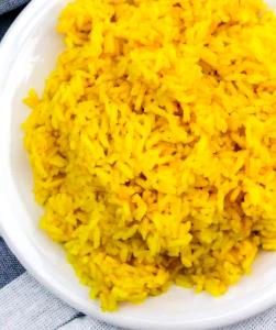 1 Oz, Dry, Yields Yellow Rice (Fat Added in Cooking)