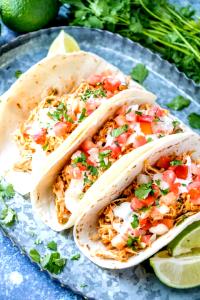 1 Oz Soft Taco with Chicken, Cheese, Lettuce, Tomato and Sour Cream