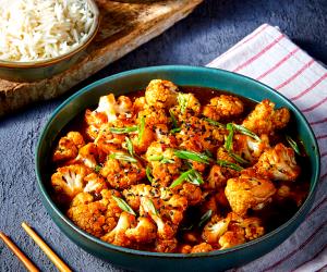 1 Portion Kung Pao Cauliflower With Pickled Carrot And Sesame Salad