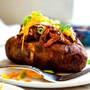 1 potato (1077 g) Texas Style Spud Beef