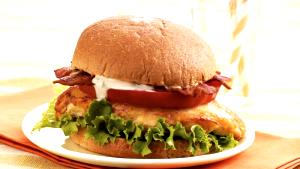 1 Sandwich Broiled Chicken Fillet Sandwich with Lettuce, Tomato and Spread on Whole Wheat Roll
