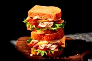 1 Sandwich Full Bacon Turkey Bravo On Tomato Basil Signature Sandwich