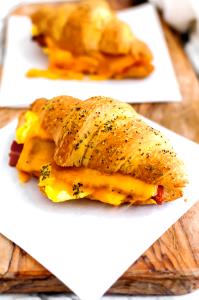 1 sandwich Mini Croissant Breakfast Sandwich with Cheddar Cheese and Bacon