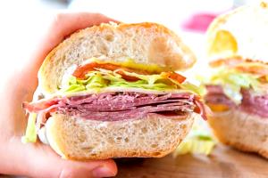 1 Sandwich Salami and Cheese Sandwich with Lettuce and Spread