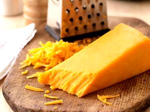 1 scoop (9 g) Cheddar Cheese