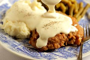 1 serving (111 g) Country Fried Steak without Peppered White Gravy