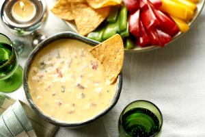 1 serving (113 g) Queso Sauce