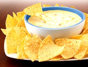 1 serving (28.5 g) Cheese Dip with American Cheese, Bell & Jalapeno Peppers
