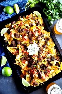 1 serving (298 g) Nachos with Meat - Carne Asada