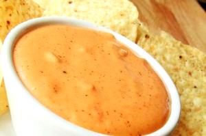 1 serving (47 g) Nacho Cheese Sauce (Side)