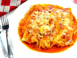 1 serving (5 oz) Cheese Enchiladas with Tofu Steaks in Spicy Red Sauce