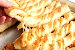 1 serving (51 g) Breadsticks with Cheese