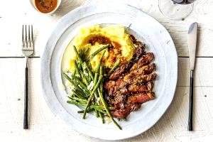1 serving (522 g) Strip Steak Over Truffled Mashed Potatoes