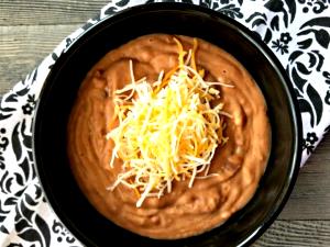 1 serving (6.3 oz) Refried Beans with Cheese
