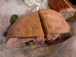 1 serving (6.75 oz) Sierra Turkey Sandwich on Focaccia with Asiago Cheese (Half)
