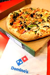 1 Serving Average Medium Hand Tossed Deluxe Pizza