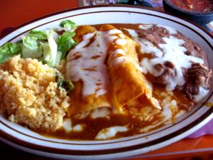 1 Serving Chicken Enchiladas W/ Rice & Sauce