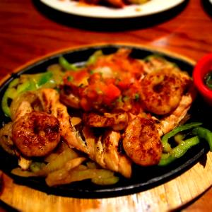 1 Serving Citrus Fire Chicken & Shrimp Fajitas