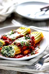 1 serving Four Cheese Manicotti with Alfredo and Tomato Sauce