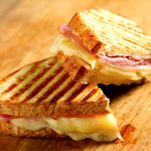 1 Serving Grilled Ham & Swiss Panini