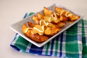 1 serving Potato Wedges with Cheese (Regular)