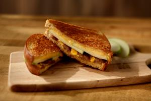 1 Serving Sausage, Cheese, Golden Bun Sandwich