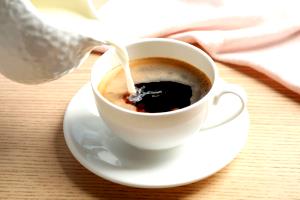 1 Serving Short - Caffe Americano - 2% Milk