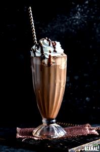 1 Serving Tall - Iced Caffe Mocha - Whip - 2% Milk