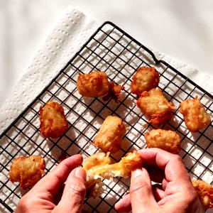 1 Serving Tater Tots W/Cheese - Regular
