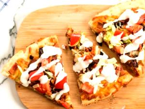 1 slice = 1/10 pizza (147 g) BLT Pizza (Large, Square)