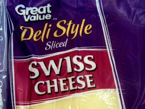 1 slice (28 g) Deli Style Thick Sliced Swiss Cheese