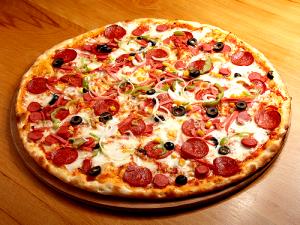 1 slice (92 g) Hot Stuff Thin Crust Pizza (Medium)