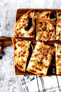 1 Slice Onion & Bacon Specialty Thin Crust Pizza