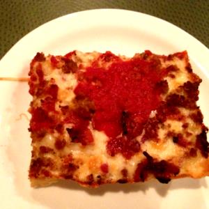 1 Slice Small Deluxe Topper Traditional Crust Pizza