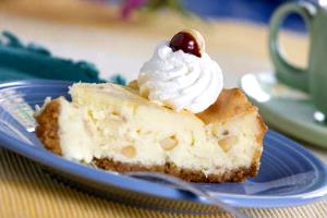 1 slice White Chocolate Macadamia Nut Cheesecake (10")
