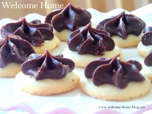 1 Small Butter or Sugar Cookie with Chocolate Icing or Filling