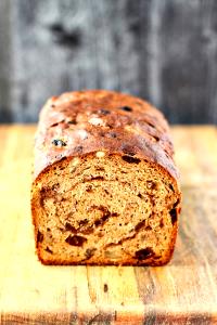 1 Thin Slice Wheat or Cracked Wheat Bread with Raisins (Home Recipe or Bakery)
